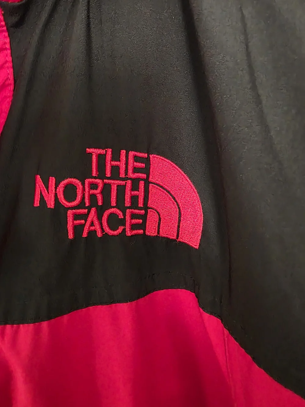 The North Face Men’s Two-Tone Red and Black Waterproof Jacket